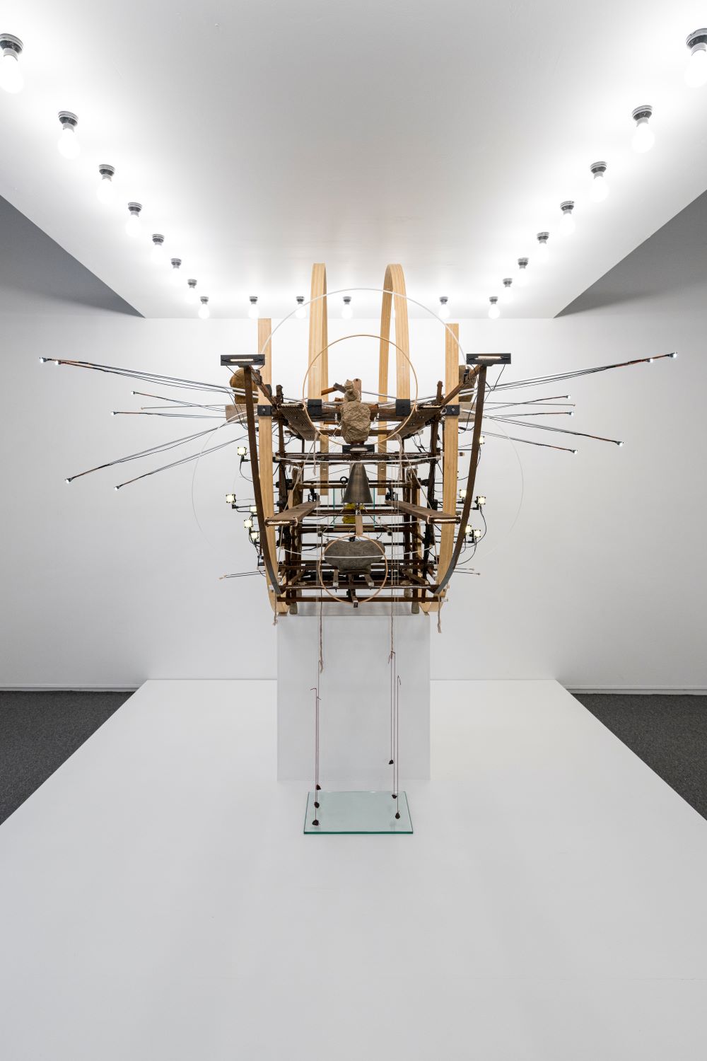 <Only the Turtle Does Not Know Our Weekends>, 2024, Wood, Motor, Light bulb, Thread, Mixed media, 120x180x300cm