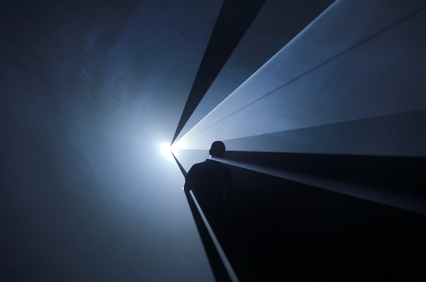 Anthony McCall, You and I Horizontal, 2006. Installation view at Institut d’Art Contemporain, Villeurbanne, France, 2006. Photo by Blaise Adilon. Courtesy of the artist, Sean Kelly New York, and Sprüth Magers.